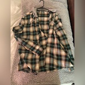 Green hooded flannel jacket.